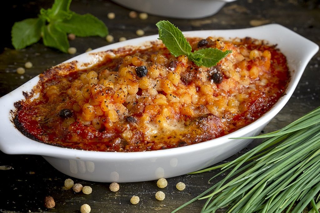 Fregola Pasta au gratin with tomato sauce - Pinocchio's Pantry - Authentic Italian Food